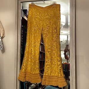 Alexis super chic laced pants with fringed hem.